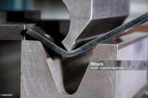 Working with sheet metal and special bending machines. hydraulic press brake or bending machine for sheet metal.